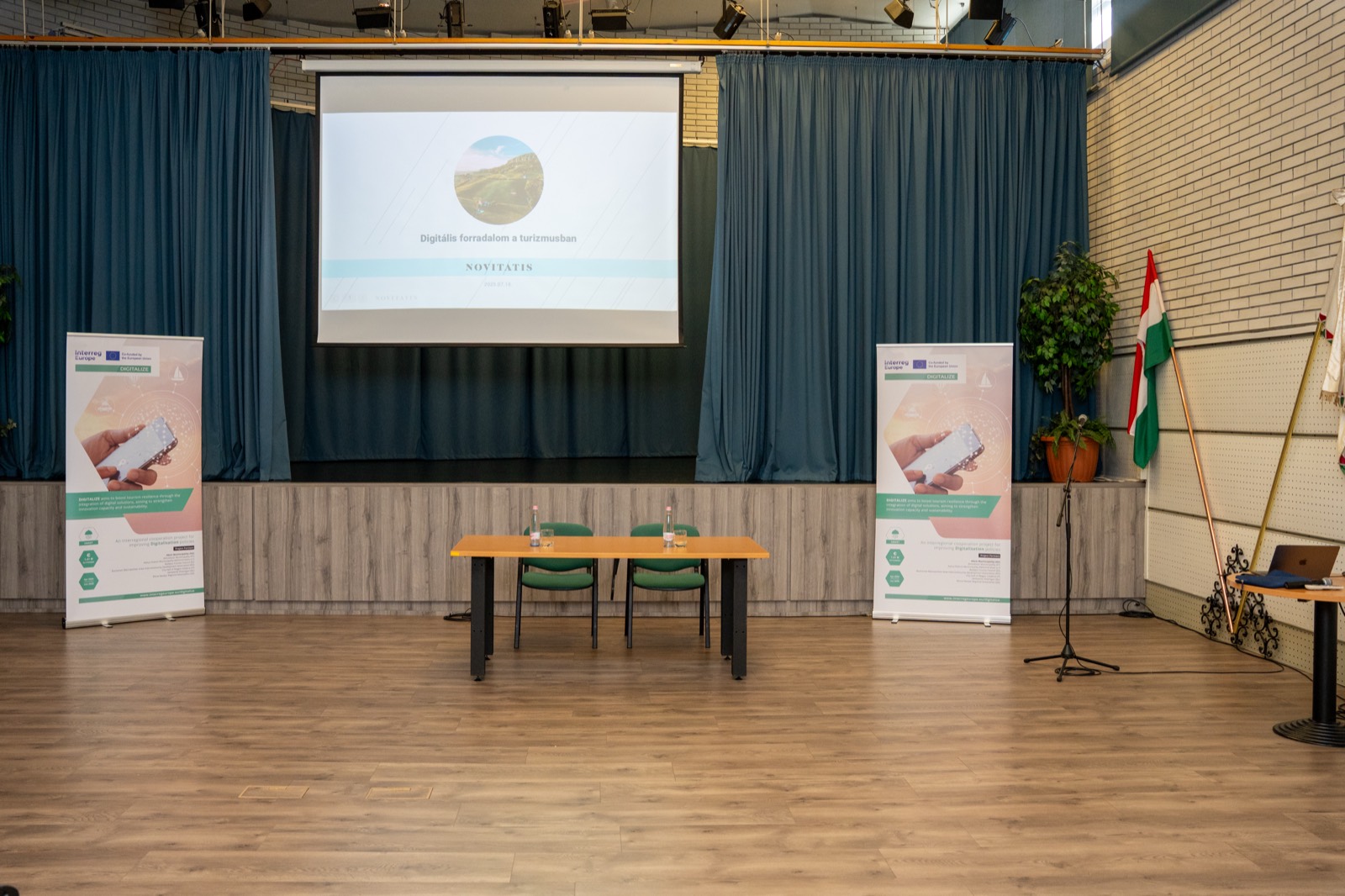 01: The “Digital revolution in tourism” title slide on the screen on the event stage (Hévíz, 2025). 02–06: Adam Schmutz speaking about the digitalization of tourism, next to the DIGITALIZE (Interreg Europe) project banner.