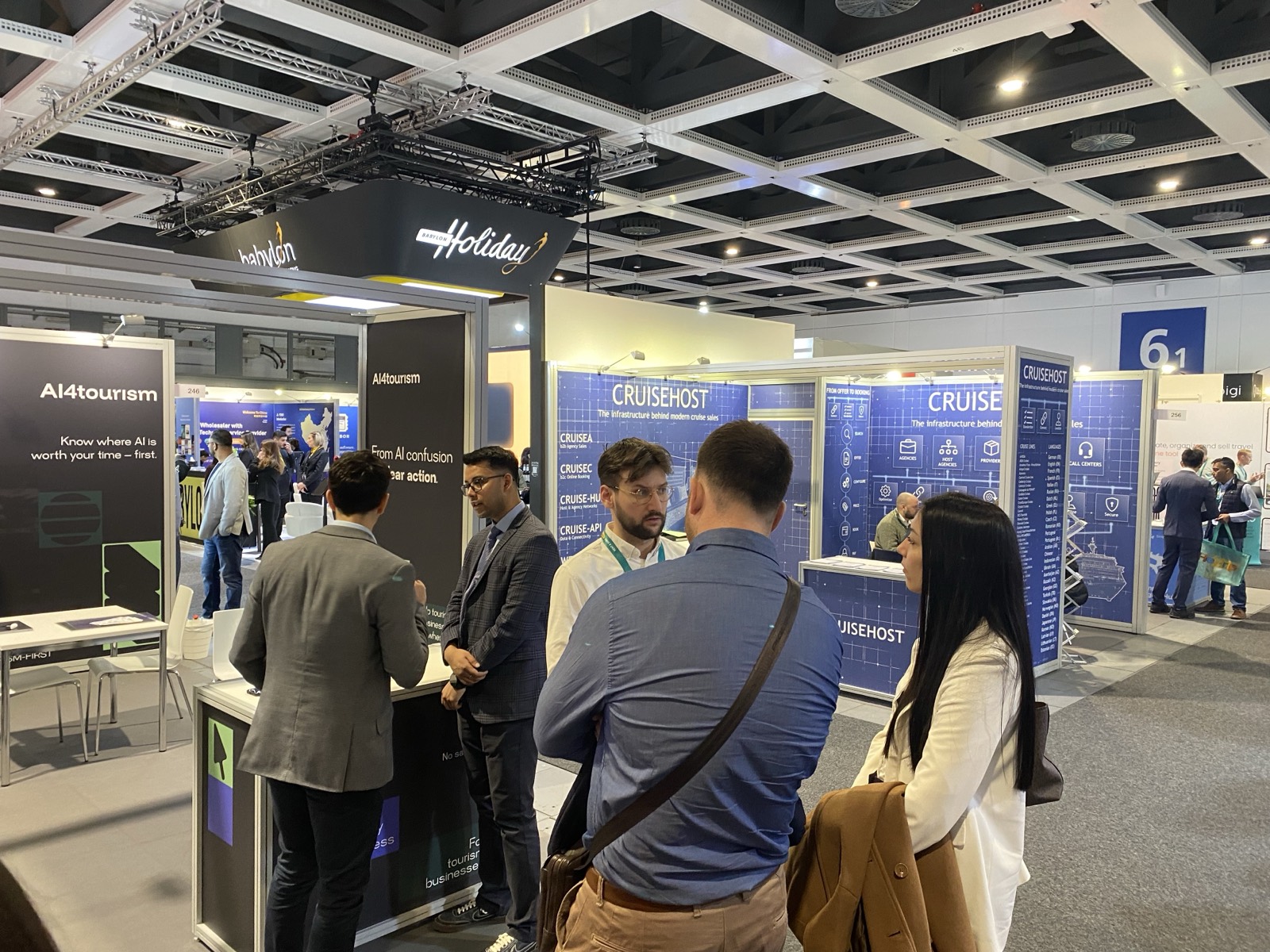 The AI4tourism stand at ITB Berlin 2026 (Hall 6.1, Stand 248) – “From AI confusion to clear action” | Conversation at the AI4tourism stand at ITB Berlin 2026 | The AI4tourism stand in Hall 6.1 of ITB Berlin, with visitors | Visitors at the AI4tourism stand at ITB Berlin 2026 | Presenting the AI4tourism solution at the ITB Berlin 2026 stand