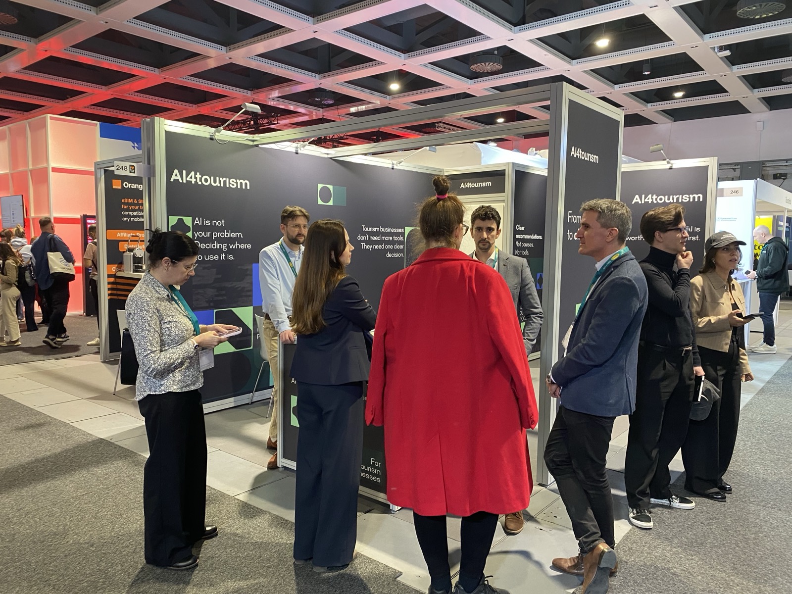 The AI4tourism stand at ITB Berlin 2026 (Hall 6.1, Stand 248) – “From AI confusion to clear action” | Conversation at the AI4tourism stand at ITB Berlin 2026 | The AI4tourism stand in Hall 6.1 of ITB Berlin, with visitors | Visitors at the AI4tourism stand at ITB Berlin 2026 | Presenting the AI4tourism solution at the ITB Berlin 2026 stand